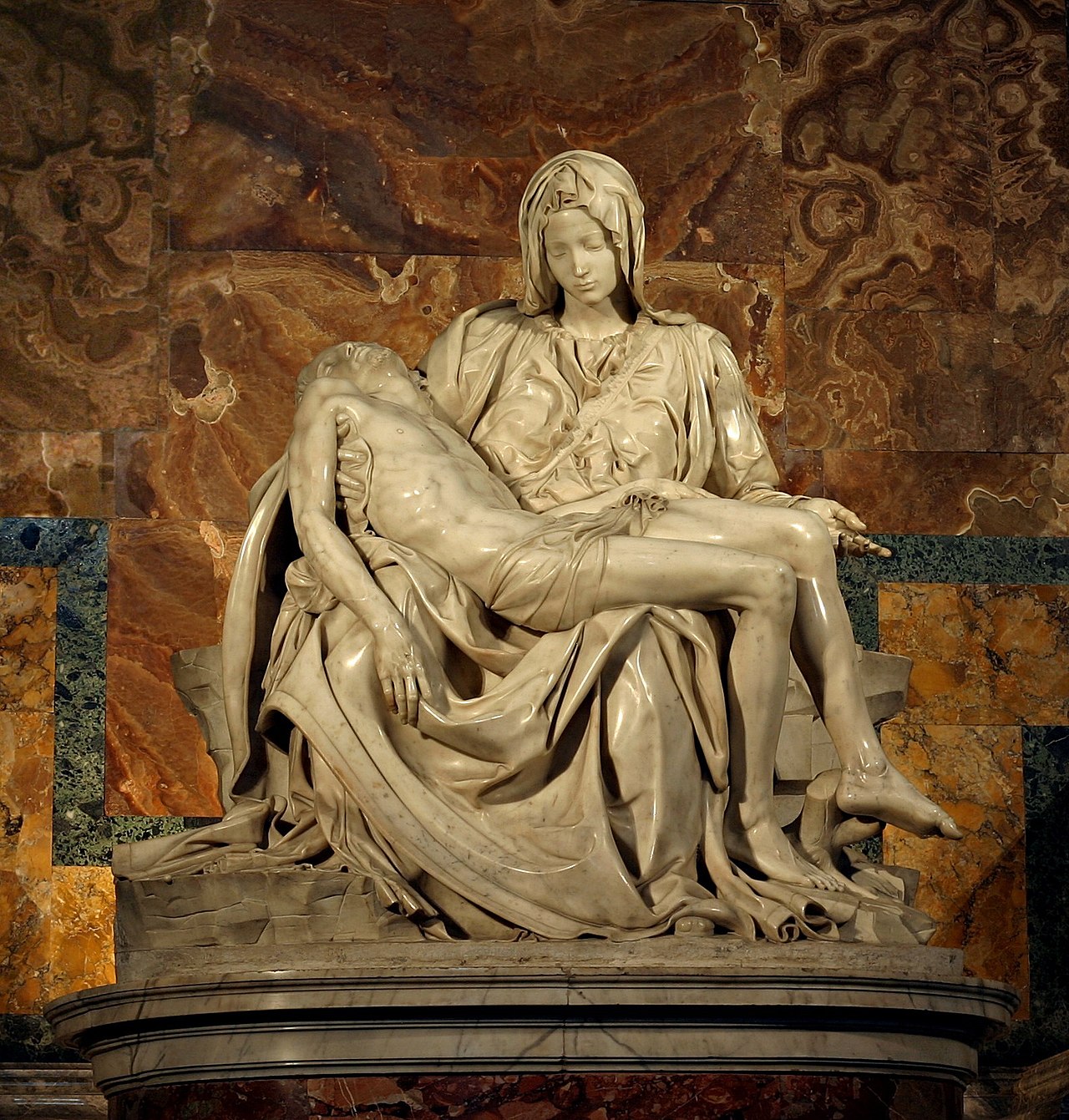 1280px-Michelangelo's_Pieta_5450_cropncleaned_edit.jpg